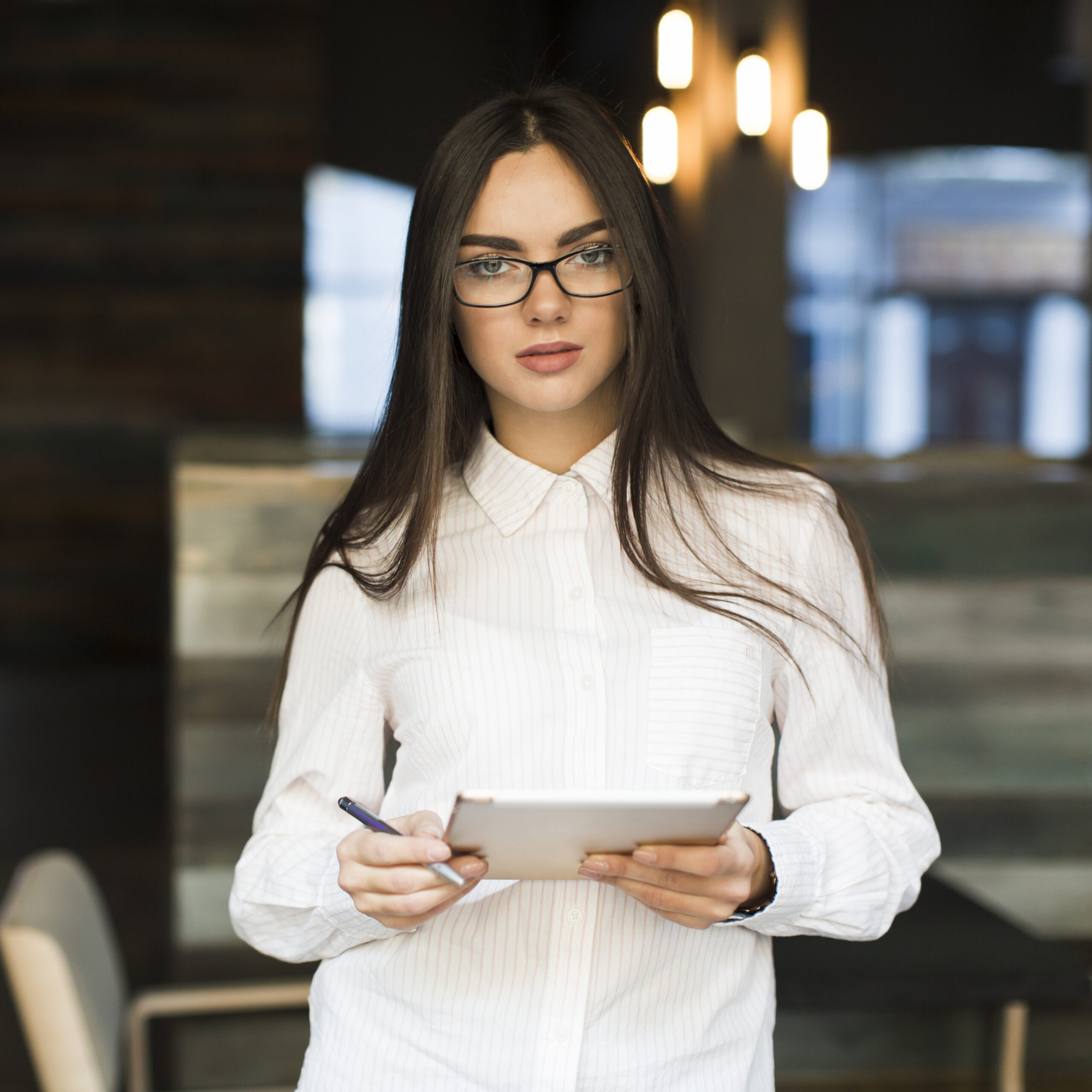 woman-with-digital-tablet-cafe