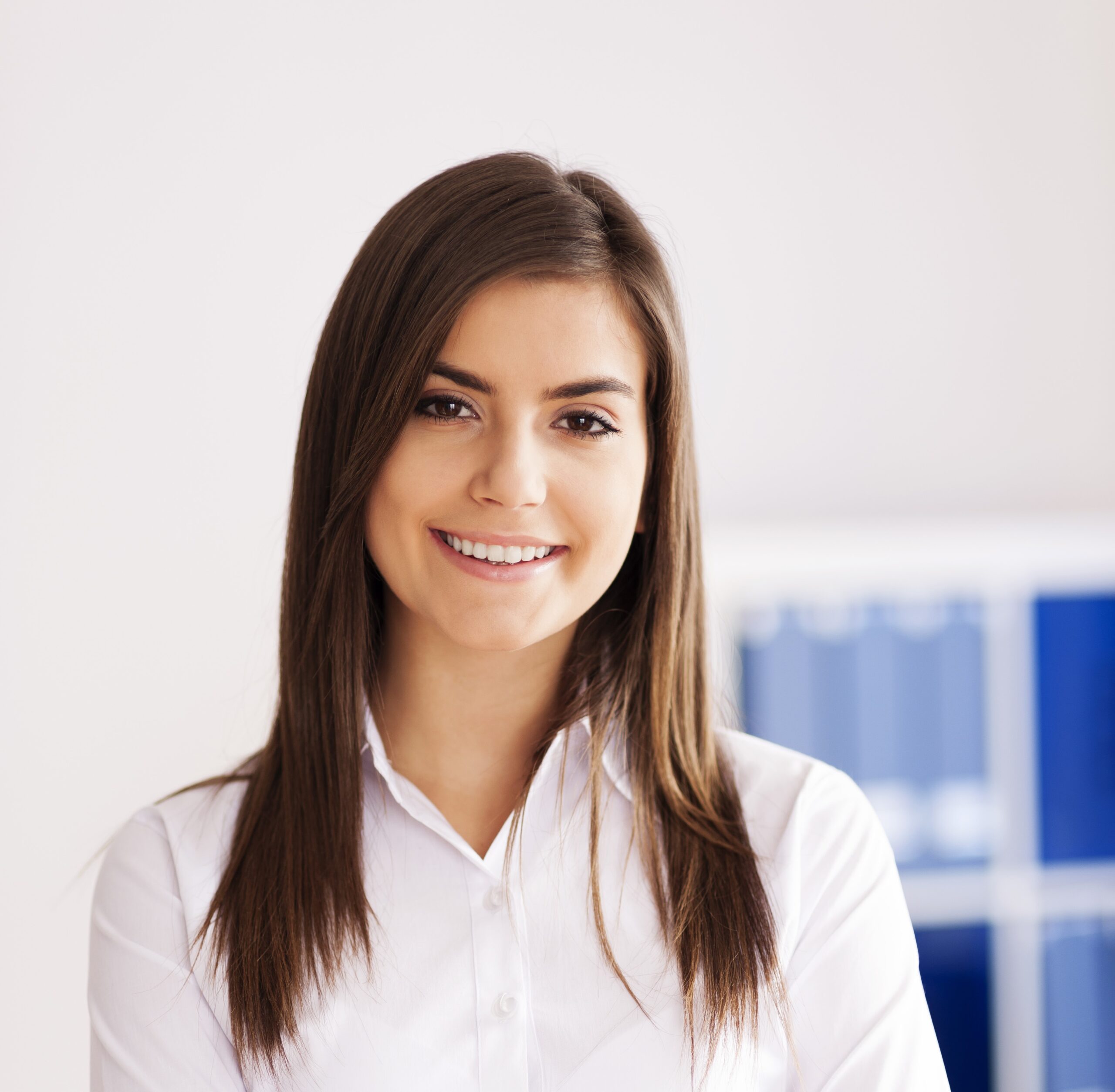 Portrait of smiling young businesswoman at office