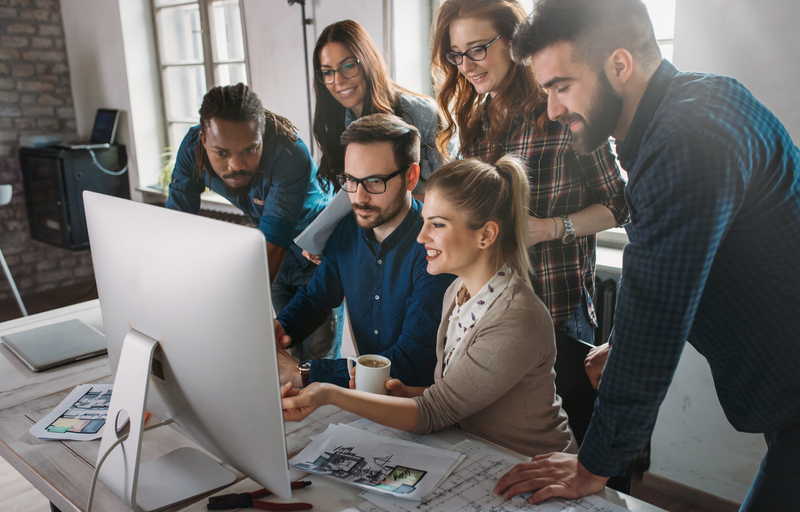 Corporate teamworking colleagues in modern office